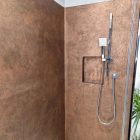 Metallic copper shower area