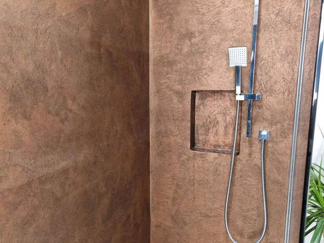 Metallic copper shower area