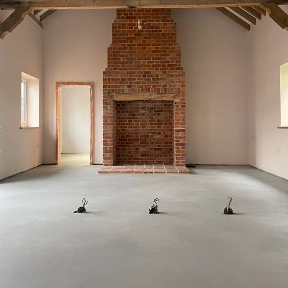 Microcement floor in a barn conversion